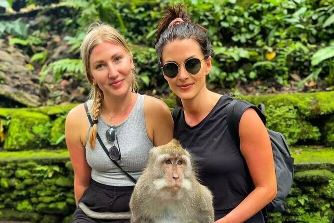 Bali Swing, Monkey Forest and Waterfall Private Tour - Kanto Lampo Waterfall: tiered rock formations and picture-worthy angles