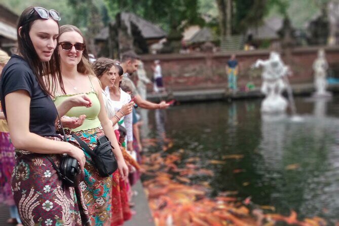 Bali Ubud Driver - Stop 3: Tegenungan Waterfall for water play and photo-ready rocks