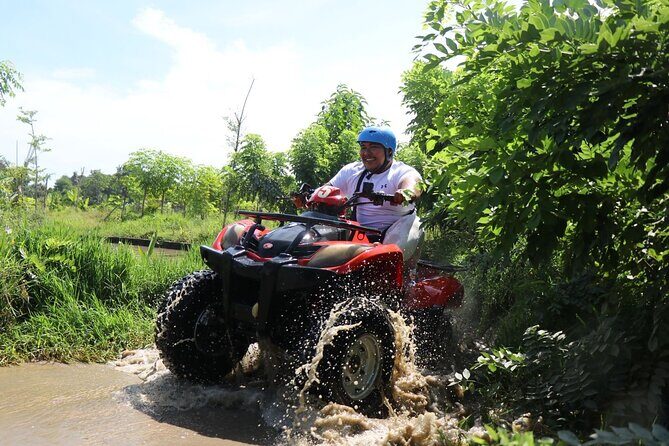Excellence Bali ATV (Quad Bike) , White Water Rafting with Swing. - White-water rafting: the adrenaline keeps going, but the pace shifts