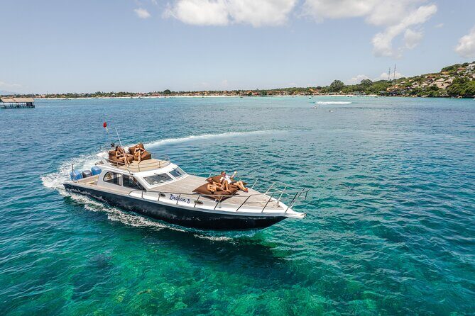 Full Day Nusa Penida by Honey Milk Yacht 13 meters - Kelingking Cliff car tour and lagoon cruising: the “land + sea” balance