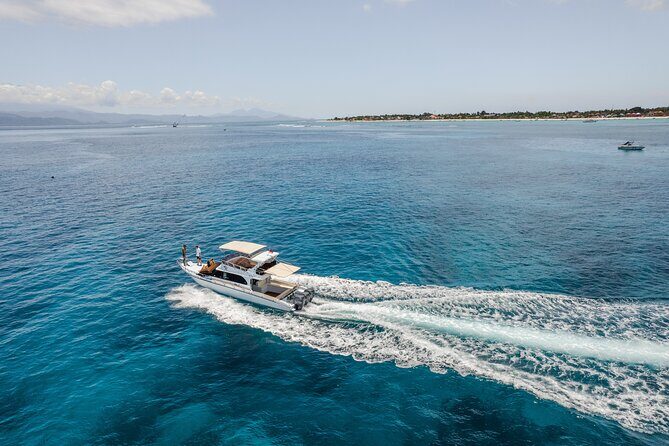 Nusa Penida Full Day Tour by Riki J Yacht 13 meters - Khamara lunch with a private white-sand beach and daybeds
