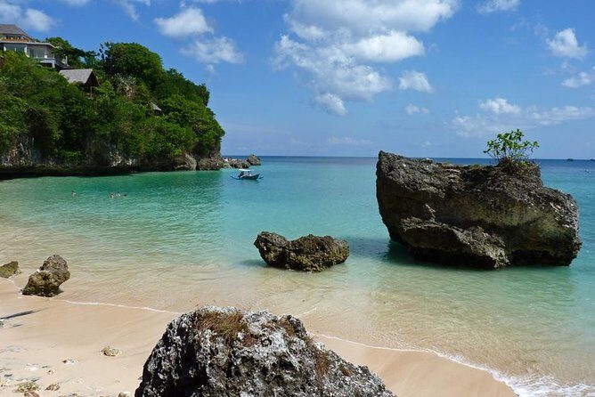 Private Tour Bali Beaches and Uluwatu Temple with Dinner - Pandawa Beach: Rocks, Views, and a Swim-Friendly Break